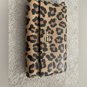 Coach ocelot clutch bag from factory store